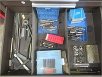 Contents of drawer that includes transfer punch