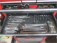 Drawer full of Craftsman wrenches, various sizes.
