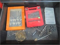 Contents of drawer that includes drill bit set