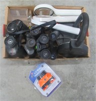 Box that includes (4) pairs of binoculars, unused