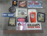 Box of various signs including Coca-Cola tray,