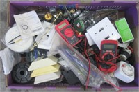 Box of electrical testing items, wire, wall
