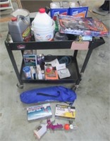 Rolling shop cart with contents that includes