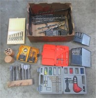 Group of large drill bits, hole saw bits, drill