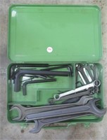 Metal tool box that includes open ended wrenches
