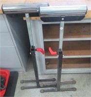 Pair of adjustable height rollers.