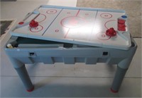 Kids gaming table, air hockey and pool.