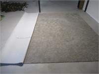 Hardly used area rug. Measures 142" W x 190" L.