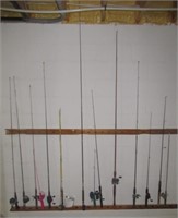 Collection of (14) various fishing poles.