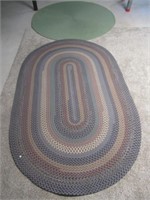 Pair of braided rugs. Measures 72" diameter and