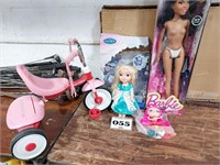 little girl's tricycle & dolls