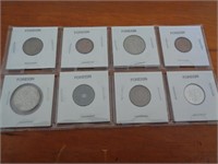 8 FOREIGN COINS