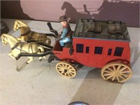 Plastic stage coach and team. 14 inches long
