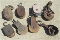 (8) Antique Wood and Cast Barn Pulleys. Marked