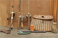 Wicker fishing creel (lid loose), rods & reels