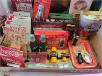 2 boxes Coca-cola items - cards, magnets, puzzles,