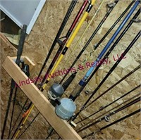 Group of fishing rods & reels various brands