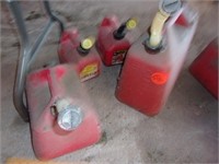 4 RED GAS CANS