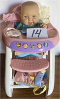 BABY DOLL IN HIGH CHAIR
