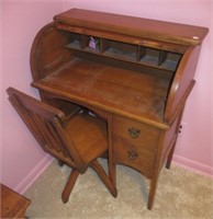 Child's rolltop desk with wood chair. Measures: