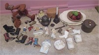 Assortment of items including decorative boots,