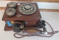 Vintage style rotary phone. Measures 10.5" tall.