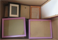 Large assortment of picture frames.