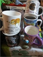 Group of coffee mugs including Marilyn Monroe