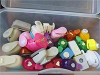 assorted punches in covered storage tote