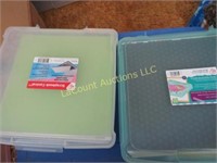 2 containers 12" x 12" scrapbooking paper assorted