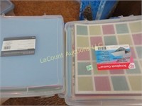 2 containers 12" x 12" scrapbooking paper assorted