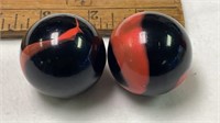 2 reb and black 40mm boulder marbles