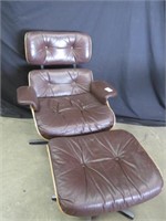 BROWN LEATHER SWIVEL CHAIR WITH OTTOMAN