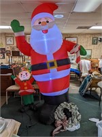Inflatable SANTA with Elf. 8' +/- with storage tub