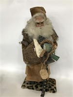 Handmade velvet robed Santa statue