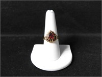 10K GOLD RING WITH HEART SHAPED RED CENTER STONE