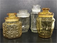 Four vintage glass jars