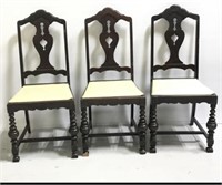 Three vintage chairs w/ vinyl seats
