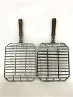 Two vintage handheld barbecue grill
