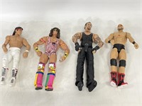 Four wrestling poseable action figures