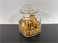 Vintage glass jar and lid with vintage dice