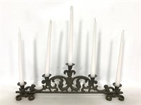 Metal candle stick holder with candles