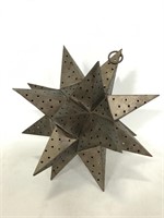 Punched metal star candle lantern