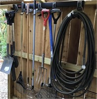 ASSORTED YARD TOOLS AND HOSE