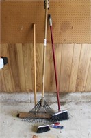 2 brooms and 1 rake