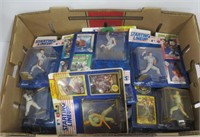 Starting Lineup action figures in packaging.