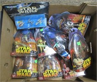 (9) Star Wars action figures in packaging.
