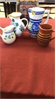 4 PAINTED PITCHERS VARIOUS SIZES