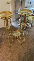 Golden metal plant stand . Set of 3