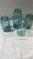 4 blue glass mason jars